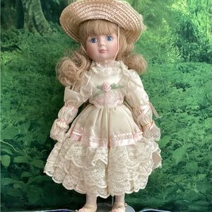 Elegant Cream and Pink Porcelain Doll